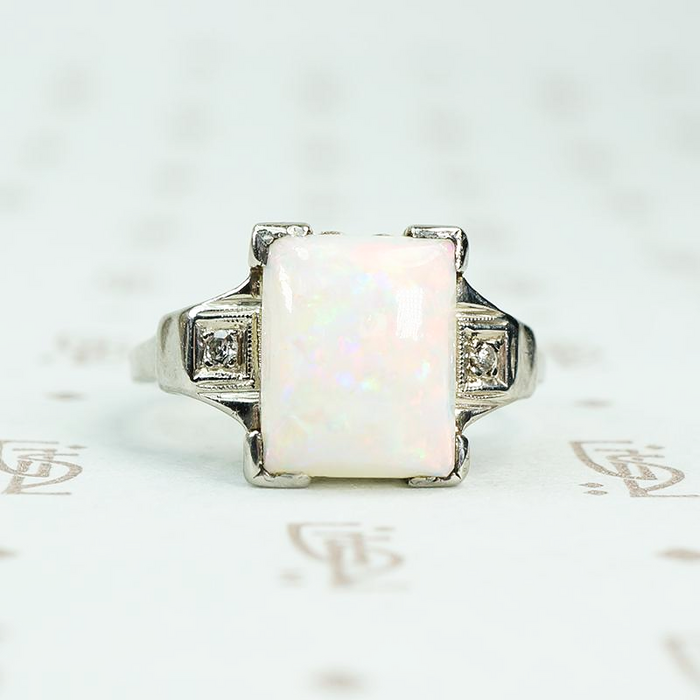 rectangular opal in white gold with diamond sides