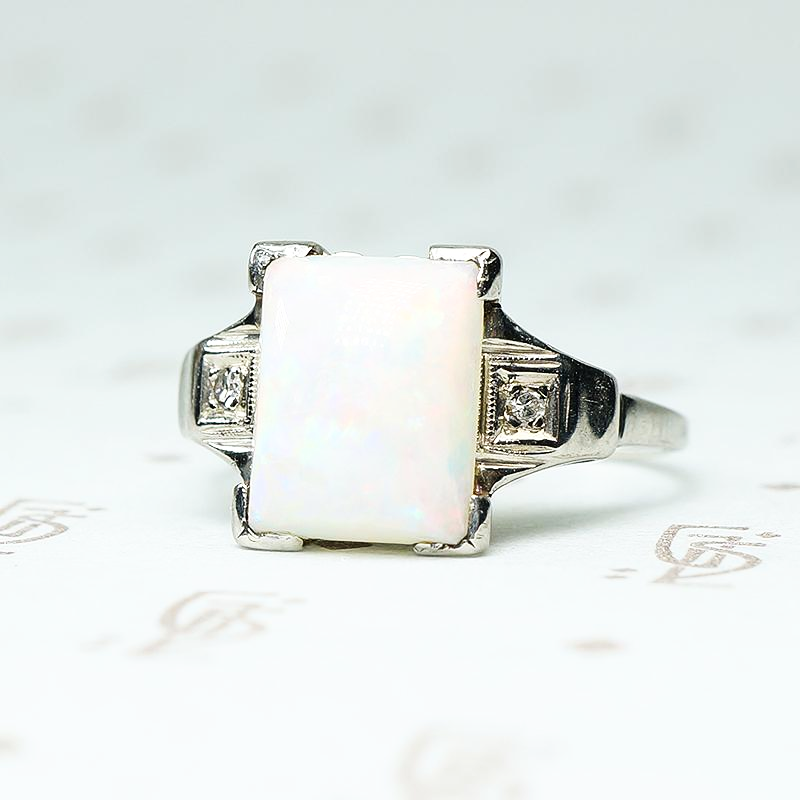 rectangular opal in white gold with diamond sides