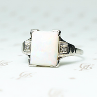 rectangular opal in white gold with diamond sides