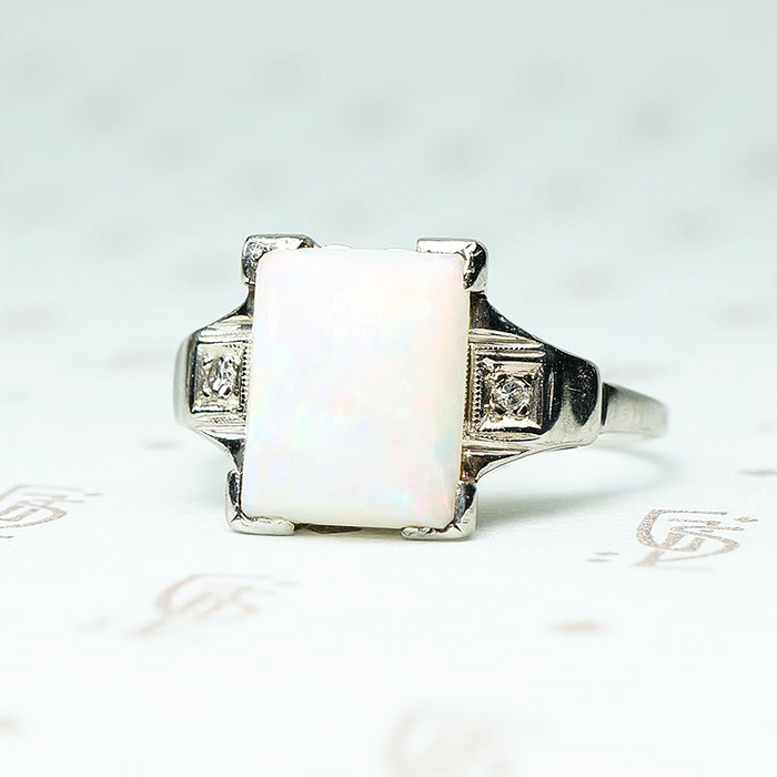 rectangular opal in white gold with diamond sides