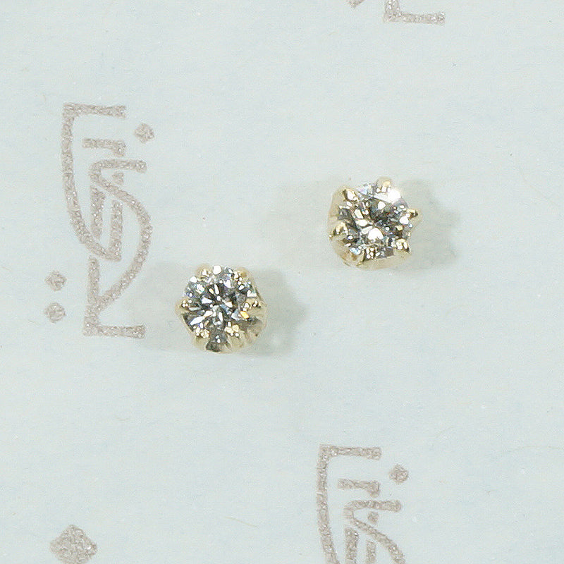 .28tcw oec diamond studs in 14k yellow gold