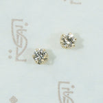 .28tcw oec diamond studs in 14k yellow gold
