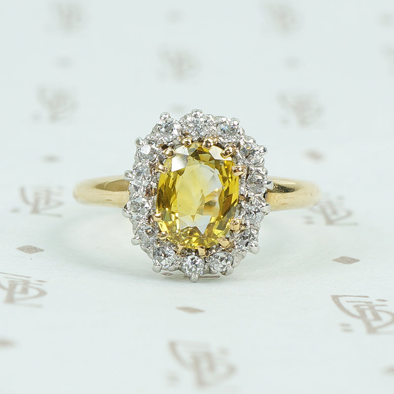 oval yellow sapphire in oec diamond halo ring