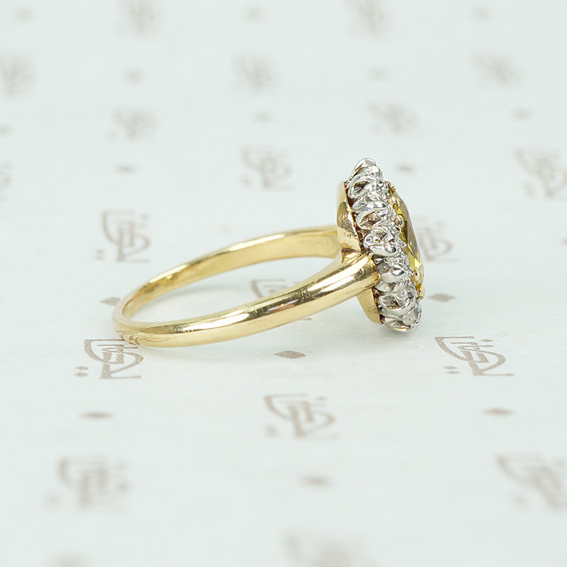 oval yellow sapphire in oec diamond halo ring