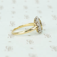 oval yellow sapphire in oec diamond halo ring