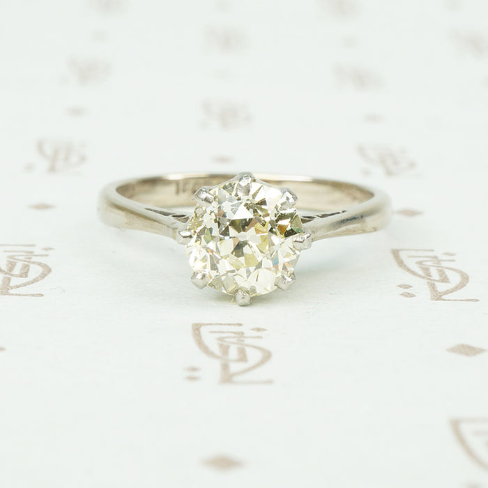 1.28 carat pale yellow old european cut diamond solitaire