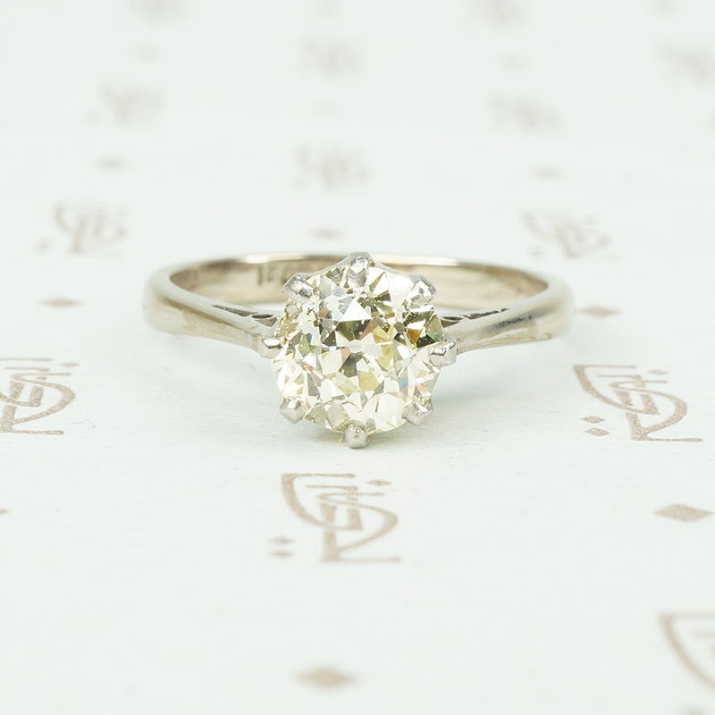 1.28 carat pale yellow old european cut diamond solitaire