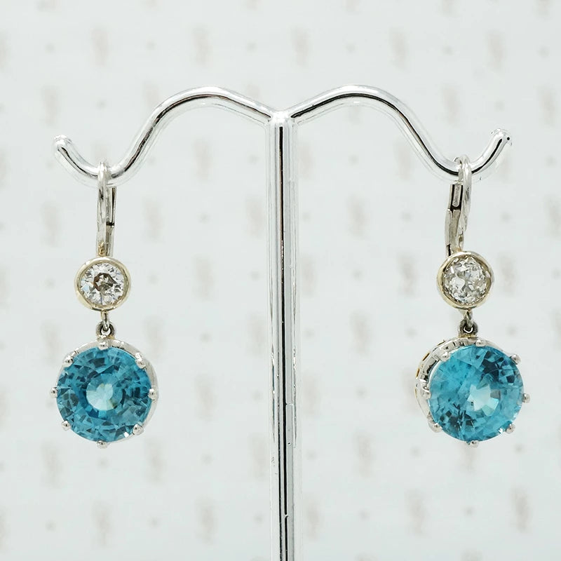blue zircon and oec diamond drop earrings on platinum ear wires