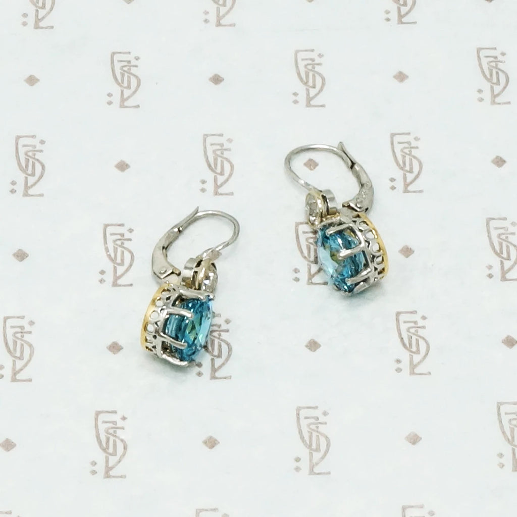 blue zircon and oec diamond drop earrings on platinum ear wires