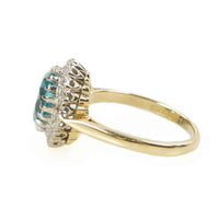 Stunning Natural Blue Zircon Surrounded by Diamonds in 18k Gold